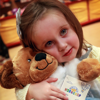 Girl hugging bear