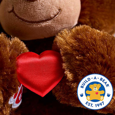 Teddy Bear plush holding a heart